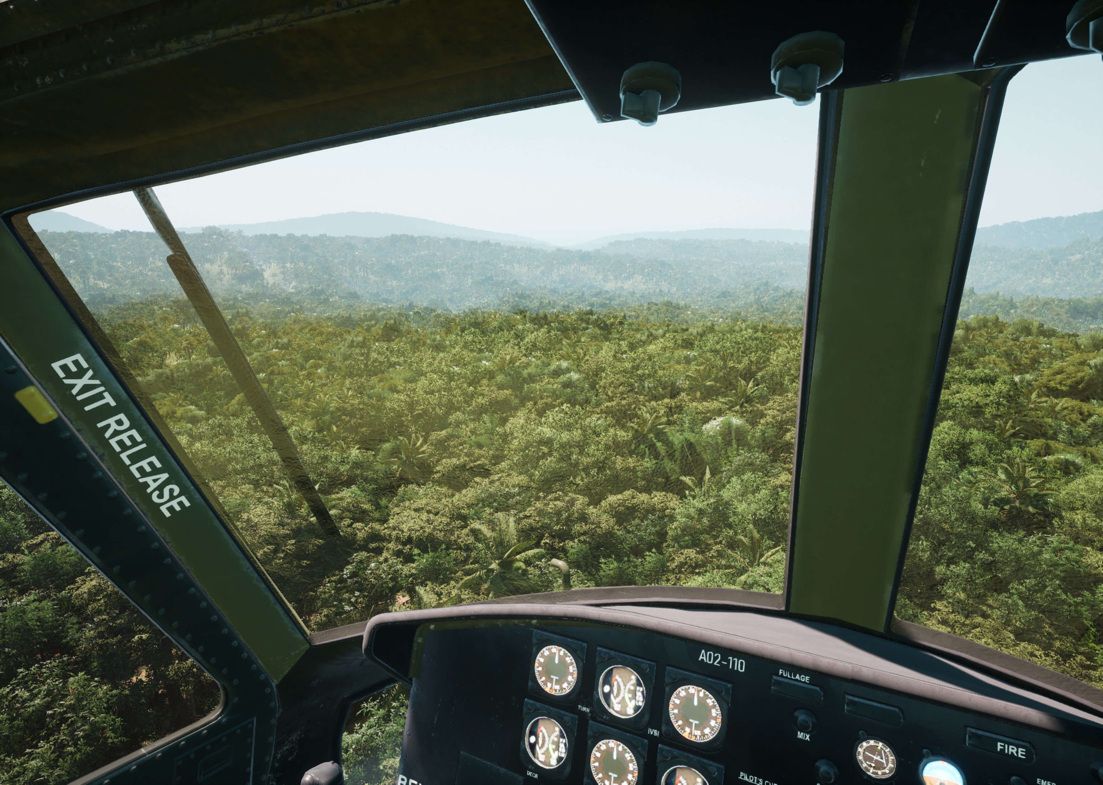 A shot of the Huey flying over the expansive jungle